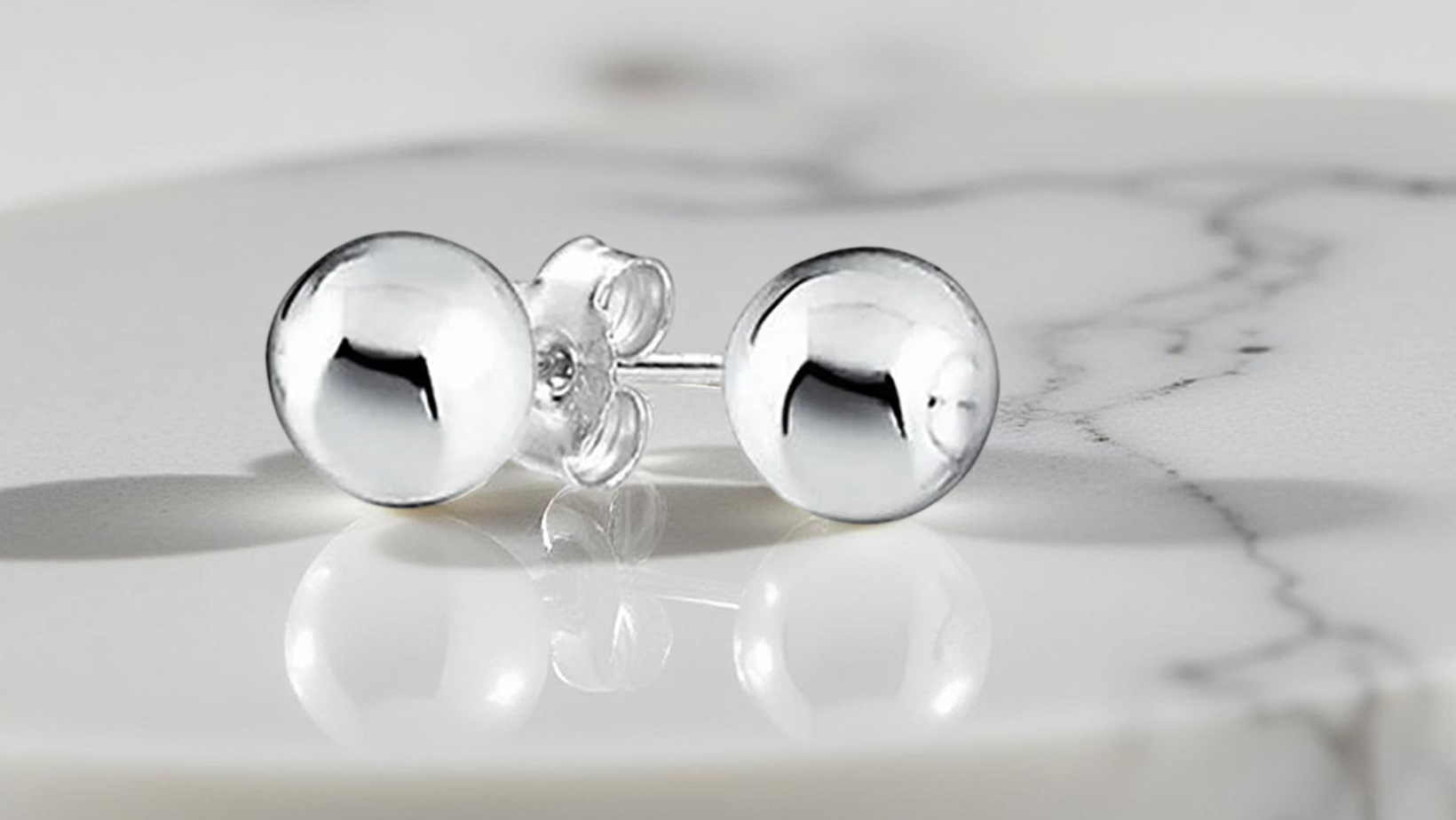 The Perfect First Pair: Why Every Jewelry Box Needs Ball Stud Earrings