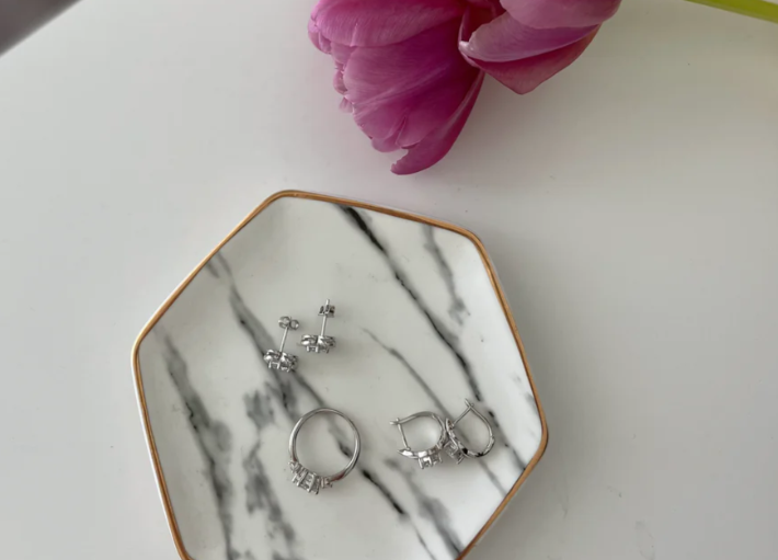  Earrings in a marble tray