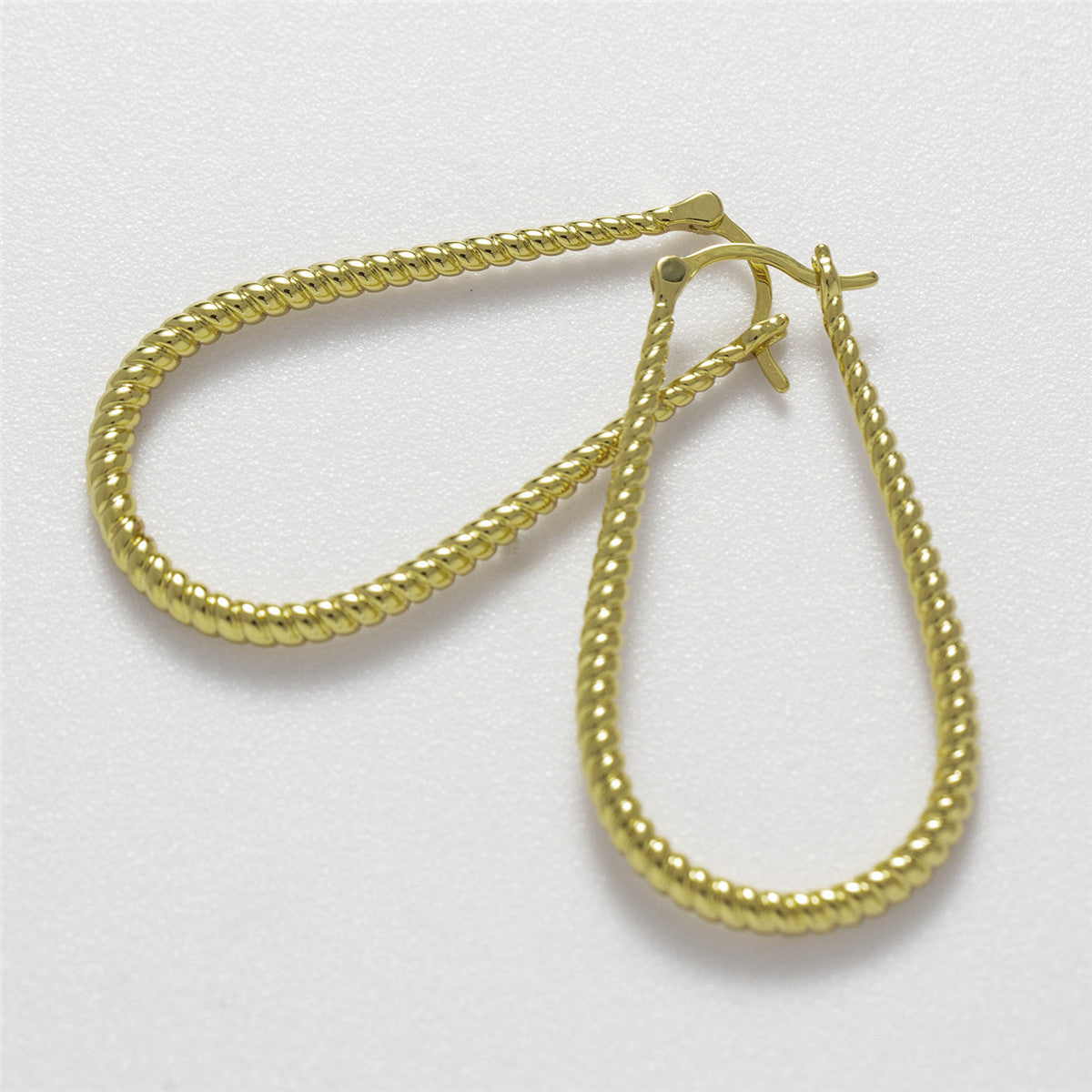 Angelica 18k White Gold Plated 24mm Twisted U-Shaped Hoop Earrings